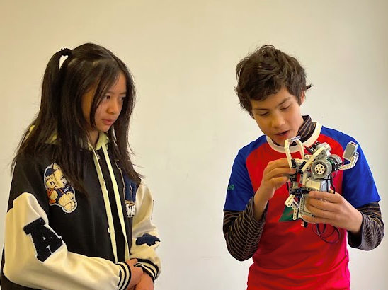 Students showcasing their LEGO EV3 robots